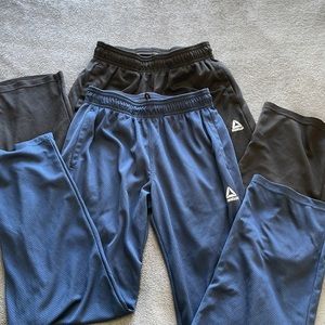 2 pair Reebok athletic pant, size youth 12/14. Like new condition. Light weight.